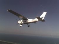 N155AT @ SGJ - Cessna 182S high over St. Augustine, FL - by Jim Watson