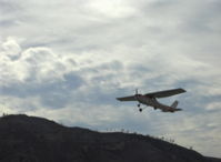 N714HH @ SZP - 1977 Cessna 150M, landing Rwy 04 - by Doug Robertson