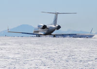 N128AB @ KAPA - Takeoff on 17L with Pikes Peak in the distance.