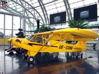 OE-CDM @ LOWS - One of the very last Piper Cubs ever built and now displayed at the Hangar 7 Museum , Salzburg Airport - by Terry Fletcher