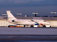 VP-CGA @ LOWS - Volkswagen's Falcon 2000 taxies off the apron for departure from Salzburg - by Terry Fletcher