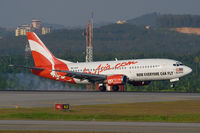 9M-AAX @ WMKK - Air Asia 737-300 - by Andy Graf-VAP