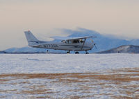 N772GK @ KAPA - Cleared for Takeoff on 17L. Pikes Peak in the distance. - by Bluedharma