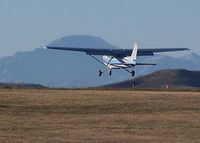 N1401E @ KAPA - Landing on 17L. Pikes Peak in the distance. - by Bluedharma