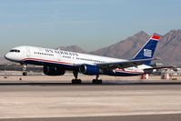 N940UW @ LAS - US Airways N940UW in new colors (FLT USA1101) from Charlotte/Douglas Int'l (KCLT) landing on RWY 25L. - by Dean Heald