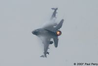 93-0554 @ GSB - High humidity, evinced by the long vortices.  She was made for the Gs