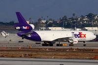 N527FE @ LAX - FedEx N527FE taxiing to the maintenance hangar.
