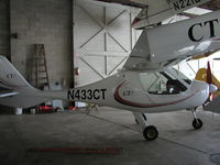 N433CT @ KSYN - Parked inside the main hangar at Stanton. - by Mitch Sando