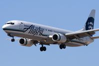 N318AS @ LAX - Alaska Airlines N318AS (FLT ASA279) from Los Cabos Int'l (MMSD) on short-final to RWY 25L. - by Dean Heald