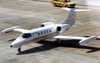 G-LEAR @ EGLL - Pictured at London Heathrow in 1986 - this aircraft is now registered A6-RJI - by Terry Fletcher