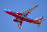 N207WN @ KSNA - Southwest B737-7H4 lifting off on a gorgeous day. - by Mike Khansa