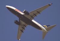 N738AL @ KSNA - Aloha B737-73A lifting off on a beautiful day. - by Mike Khansa