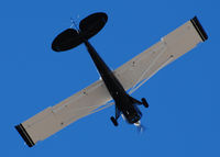 N18HU @ KAPA - Huskie flight over the hangers. - by Bluedharma