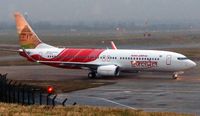 VT-AXV @ EGBB - Air India Express new B737 taxies in at Birmingham in apalling weather conditions after completing the Totonto - Birmingham leg of the delivery Flight - by Terry Fletcher