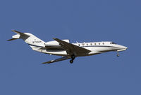 N750VP @ KSNA - Cessna 750 on short final - by Mike Khansa