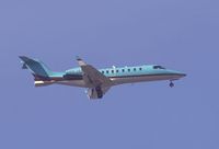 N711R @ KSNA - Learjet 45 on short final. - by Mike Khansa