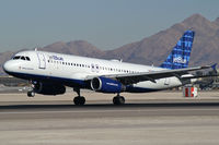 N594JB @ KLAS - jetBlue Airways - 'Whole Lotta Blue' / 2004 Airbus A320-232 - by Brad Campbell