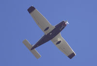N8007 @ KSNA - Piper PA-28-180 passing overhead. - by Mike Khansa