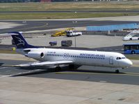 YU-AOM @ EDDF - Montenegro Airlines Fokker 100 taxies for departure at Frankfurt in 2004