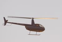 N7166C @ KLGB - Robinson R.44 Helicopter - by Mike Khansa