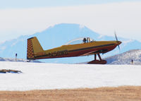 N58WB @ KAPA - Waiting for clearance on 17L. Pikes Peak in the distance.