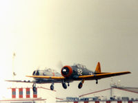 N9065Z @ GKY - Departing Arlington (along with N97AW) for 50th Anniversary Pearl Harbor Day Flyover 1991 - by Zane Adams