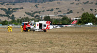 N495DF @ E16 - CALFIRE/CDF Bell EH-1H/Chopper #106 taking a break @ South County Airport (Morgan Hill), CA - by Steve Nation