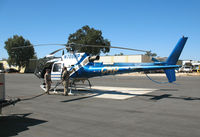 N708HP @ PRB - California Highway Patrol/CHP flight crew fueling 1999 Eurocopter AS 350 B3 @ Paso Robles Municipal Airport, CA - by Steve Nation