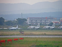 61-5217 @ RJFZ - T-33A/Tsuiki AB (Storage area) - by Ian Woodcock