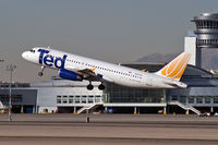 N487UA @ KLAS - Ted Airlines / 2002 Airbus Industrie A320-232 - by Brad Campbell