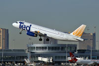 N487UA @ KLAS - Ted Airlines / 2002 Airbus Industrie A320-232 - by Brad Campbell