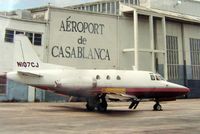 N107CJ @ OPF - Despite the background titles (used for a Film set) - this photograph was taken at Opa Locka in 1992 - by Terry Fletcher