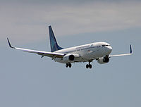 PK-GEE @ WADD - Approaching RW 27 at DPS - by Lutomo Edy Permono