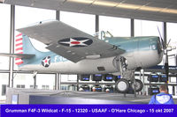12320 - Arriving at O'Hare, a small Grumman F-15 Wildcat (BuNo 12320) attracks more attention than the big Jumbo's ouside - by Loe M M Baltussen, NL