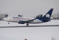 XA-MAH @ YOW - Landing on runway 25 - by Gil Boudreault