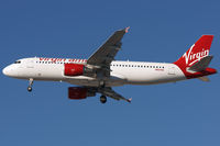 N621VA @ LAS - Final for RWY25L. - by Mark Kryst - YXUphoto