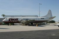 N590HG @ KOPF - DHL L-188 - by Andy Graf-VAP
