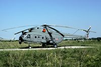 12410 @ LYBT - This Mi-8 is heavily modified: over and underneath the cockpit several modifications can be seen. - by Joop de Groot