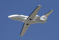 N403CM @ KSNA - Cessna 510 climbing up - by Mike Khansa