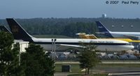 N147UP @ RDU - Amidst a packed cargo ramp - by Paul Perry