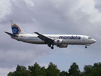 PK-RIT @ WADD - On final RW 27 at DPS - by Lutomo Edy Permono
