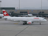 HB-IJR @ LSZH - Rolling to it's parking spot in dark weather - by Alex Smit