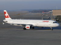 HB-IOF @ LSZH - Rolling towards it's parking spot in the late afternoon sun - by Alex Smit