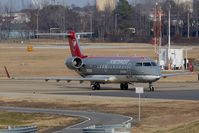 N8505Q @ ORF - Northwest JetAirlink (by Pinnacle Airlines) N8505Q (FLT FLG3703) from Detroit Metro Wayne County (KDTW) taxiing to the terminal via Charlie after a long landing rollout.
