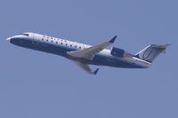 N973SW @ KLAX - United Express Canadair Regionaljet - by Thomas Ramgraber-VAP