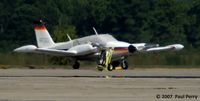 N43GS @ POB - Personal conveyance on the ramp, well away from the action