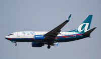 N300AT @ KATL - On final for Runway 26R - by Michael Martin
