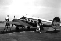 N32M @ LAN - July 4, 1962 - Dad fills the tanks while Mom & the kids scramble aboard (I'm already inside & up the aisle). - by Gerry Asher