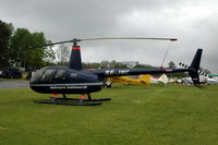 SE-JMC @ ESKB - Robinson R44 at Barkarby airfield, Stockholm, Sweden.