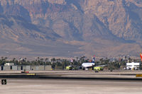 N665AW @ KLAS - US Airways / 2001 Airbus Industrie A320-232 / This landing prompted all McCarran's Emergency Vehicles to stand-by. No mishap occured. - by Brad Campbell
